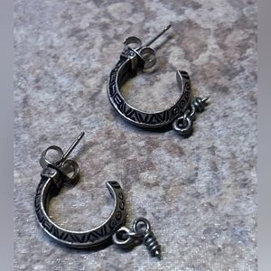 Vintage artisan-style silver hoop earrings (unmarked) with etched geo design